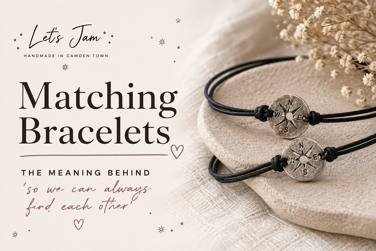 Let’s Jam matching black cord bracelets with silver compass charms, handmade in Camden Town, symbolising “so we can always find each other.”