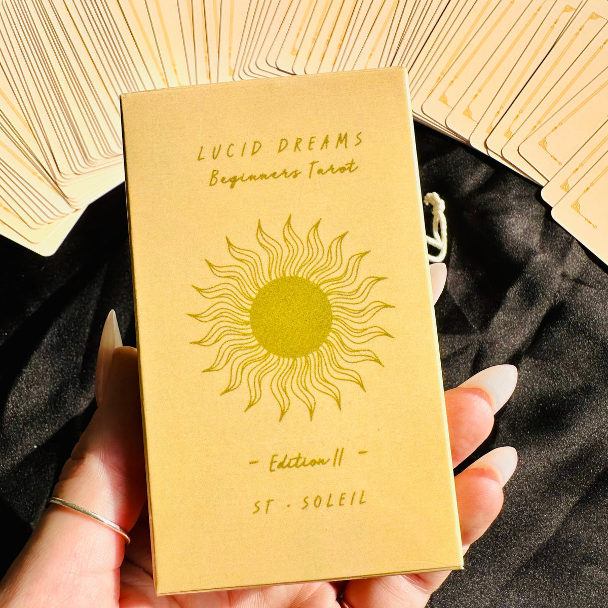 Close view of a Lucid Dreams tarot card and its pared-back line drawing - Let's Jam tarot and oracle, Camden Market London