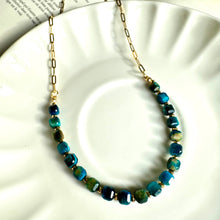 Load image into Gallery viewer, Blue tiger's eye necklace coiled on a white plate - Let's Jam jewellery, Camden Market London