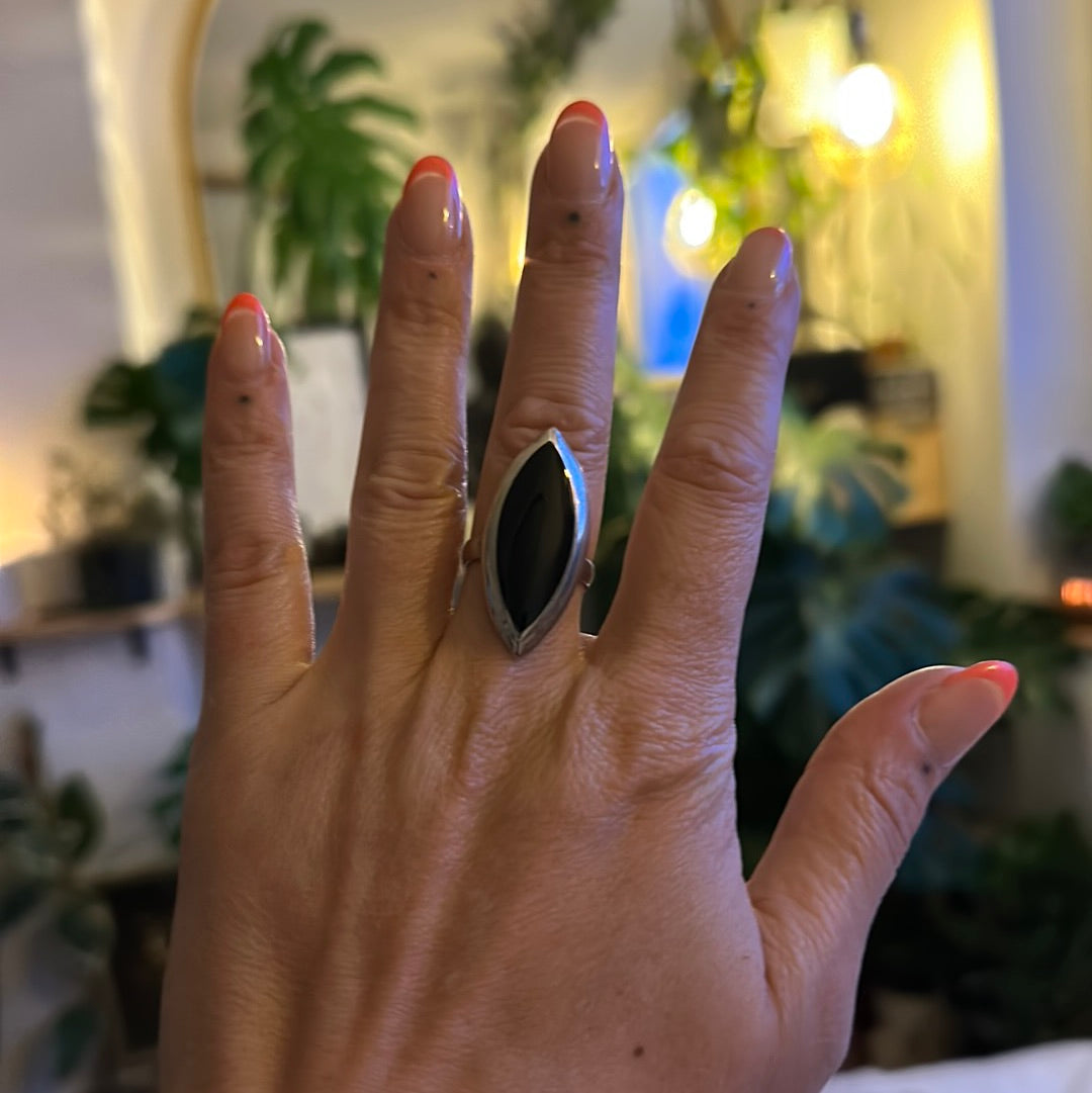 Handmade 925 sterling silver ring with a marquise eye-shaped black obsidian stone, adjustable band worn on hand - Let's Jam jewellery collection