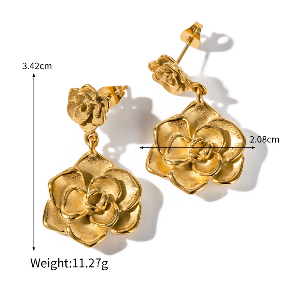 Close-up of the two linked flower charms on the drop earring - Let's Jam jewellery, Camden Market