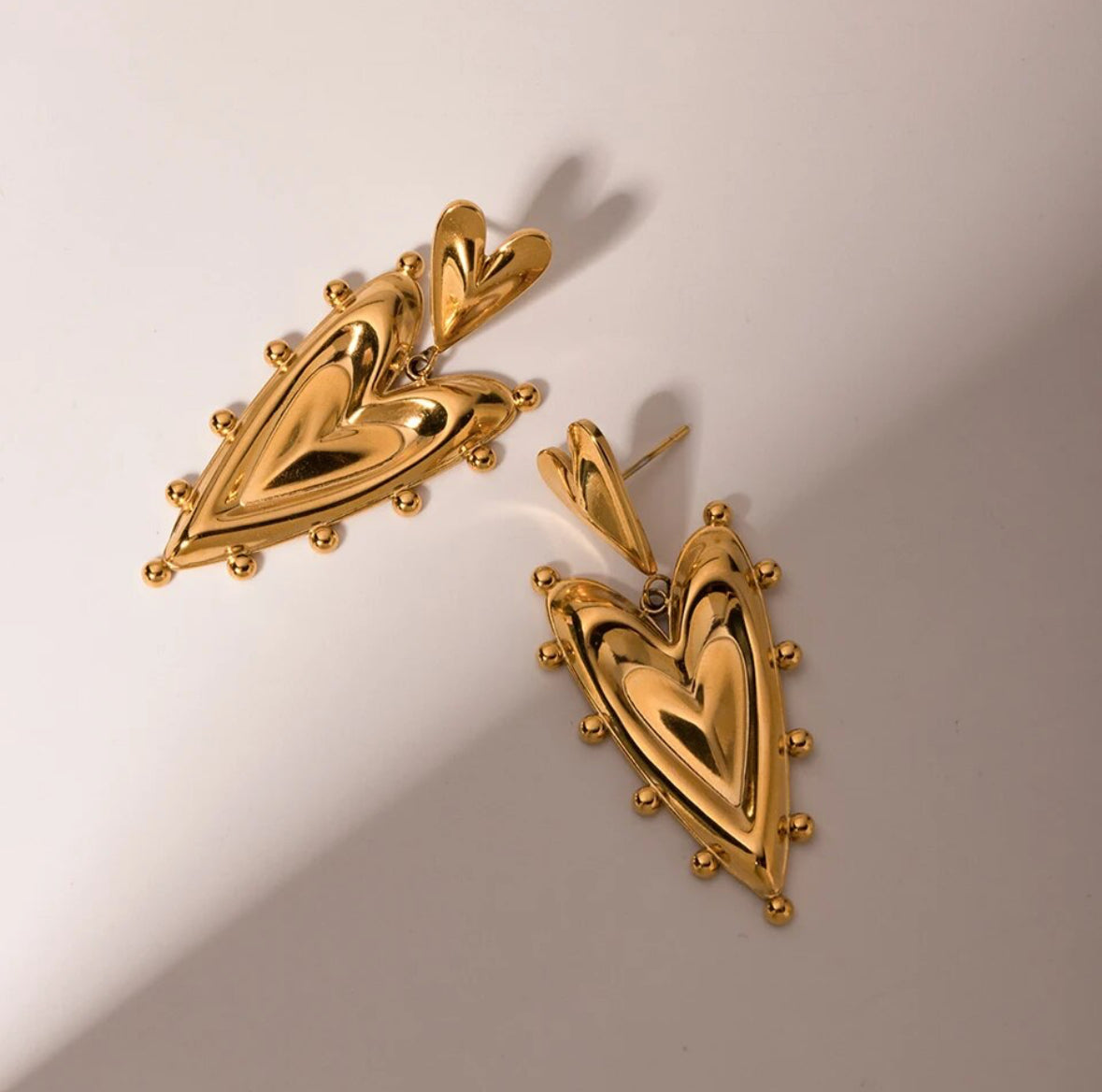 Gold-plated stainless steel layered heart drop earrings shown as a pair - Let's Jam jewellery, Camden Market London