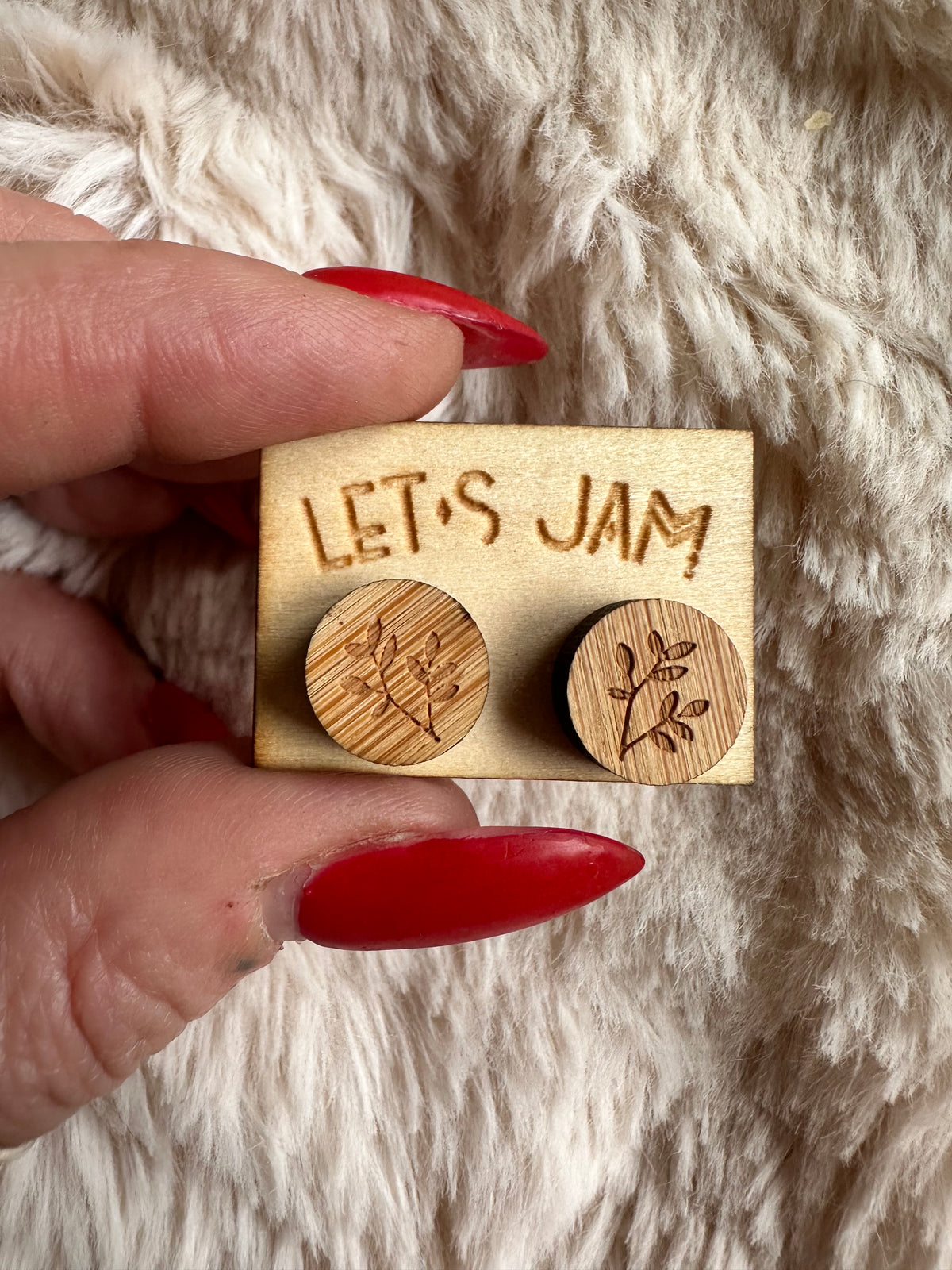 Pair of petite wooden leaf studs presented on a display card - Let's Jam jewellery, Camden Market London
