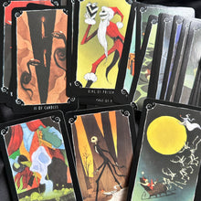 Load image into Gallery viewer, Nightmare Before Christmas tarot cards fanned out to show the spooky illustrations - Let's Jam, Camden Town