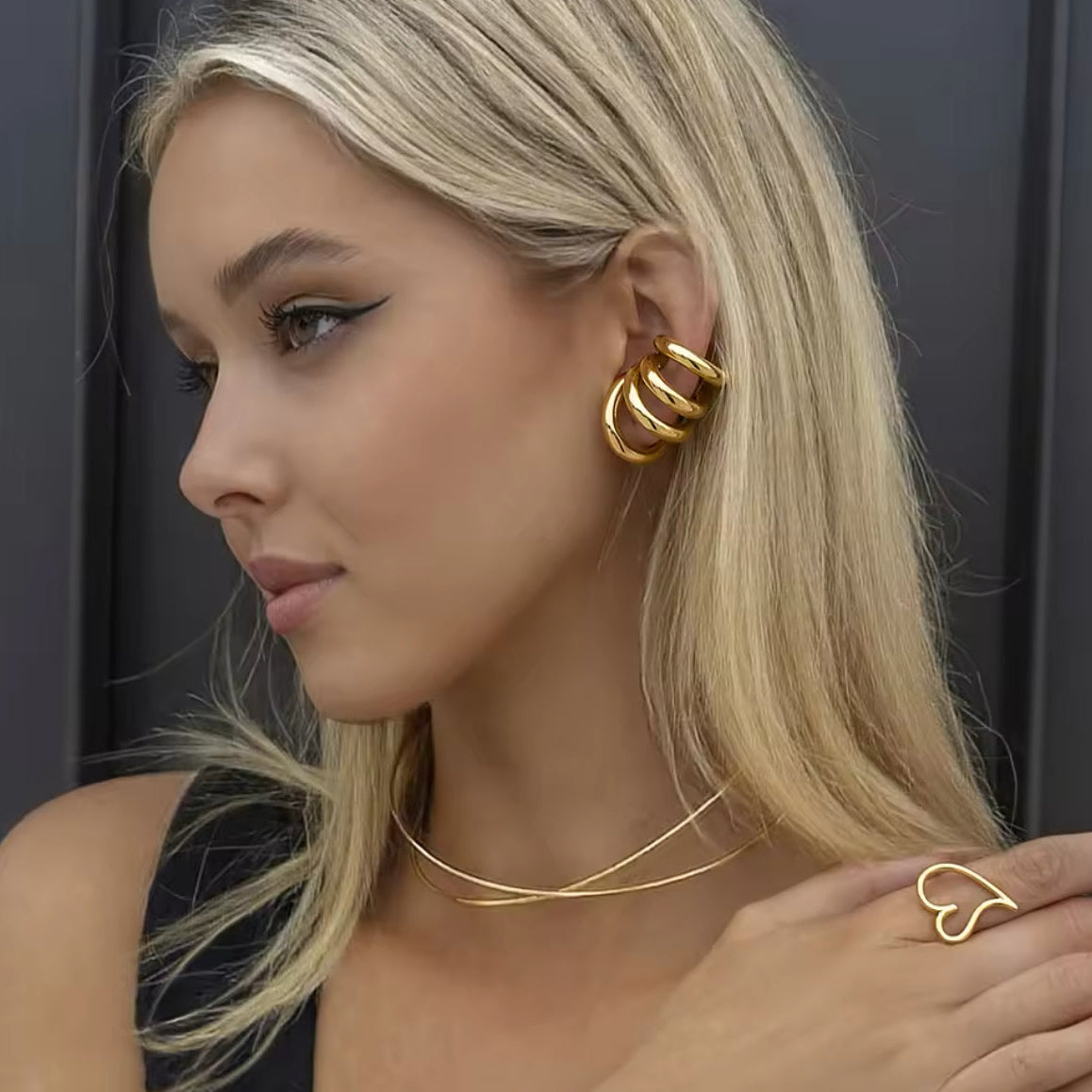 Close-up of the four-layer cuff wrapped around the outer ear - Let's Jam jewellery, Camden Town