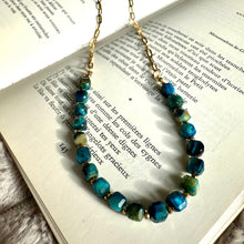 Load image into Gallery viewer, Blue beaded necklace worn on the neck with the gold chain at the back - Let's Jam, Camden Town