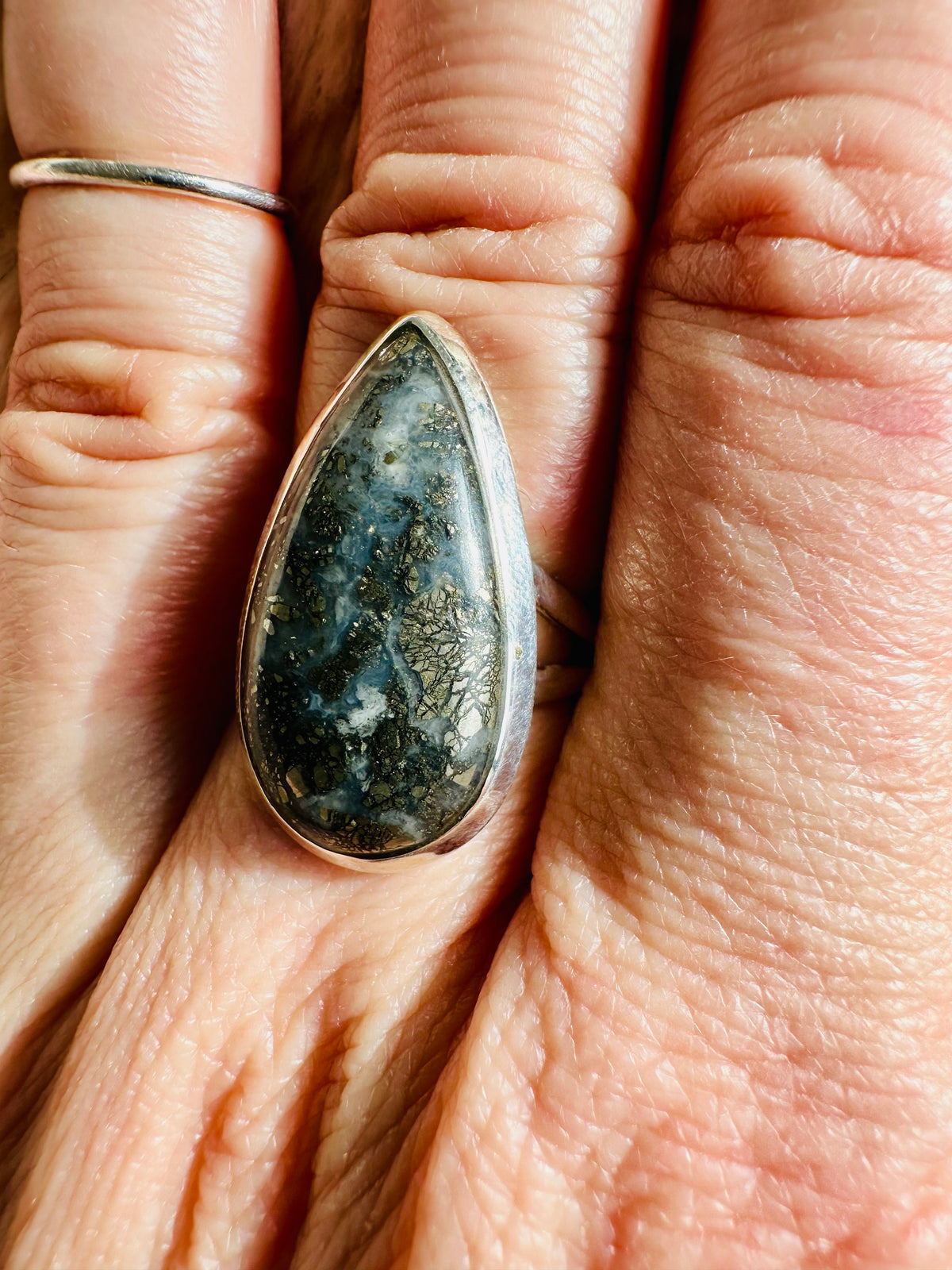 Teardrop pyrite cabochon with green and gold matrix in a sterling silver bezel - Let's Jam handmade jewellery, Camden Market