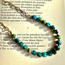 Load image into Gallery viewer, Close-up of the deep blue tiger's eye beads catching the light - Let's Jam jewellery, Camden Market