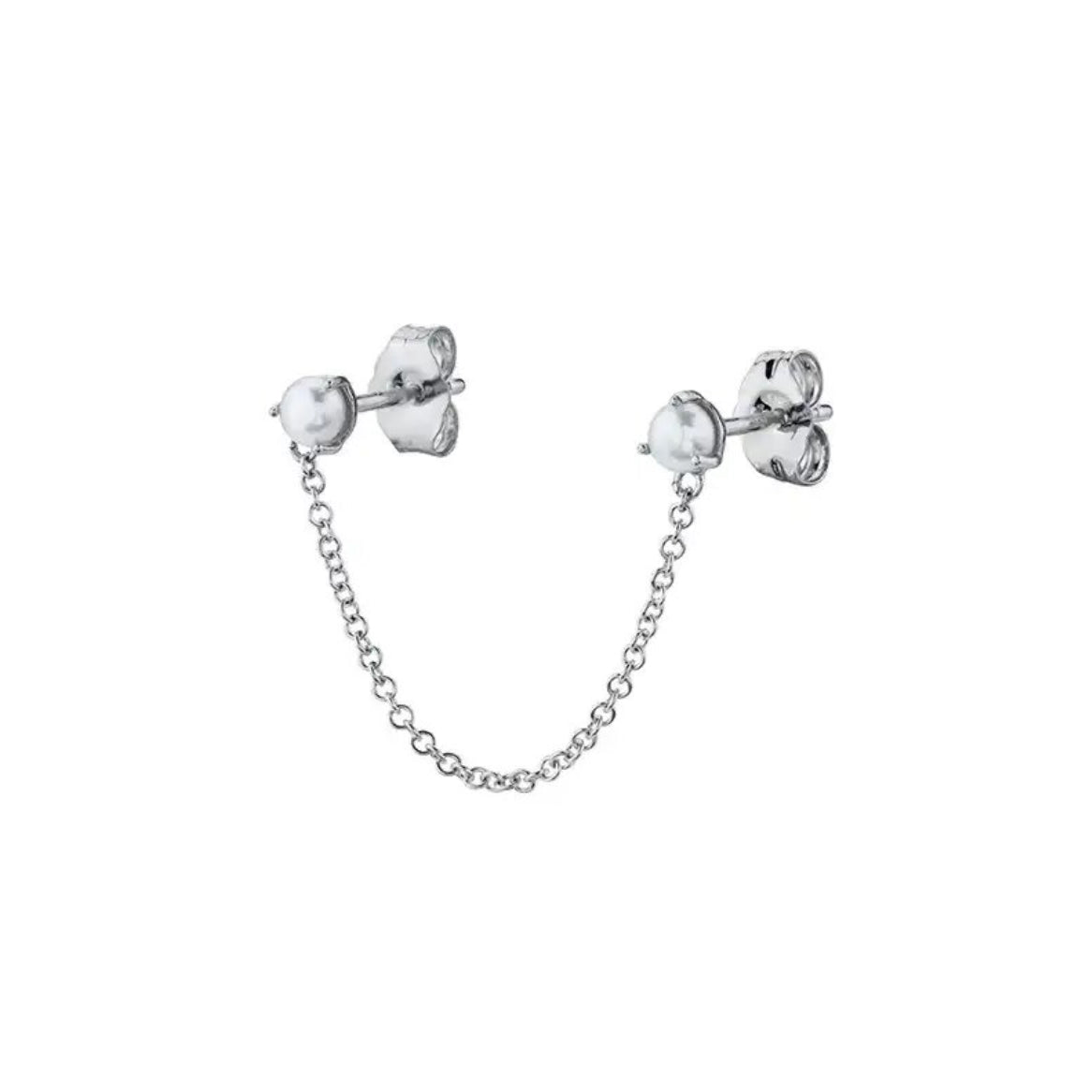 Pearl double stud earrings worn with a matching pearl ear cuff - Let's Jam, Camden Market, London