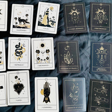 Load image into Gallery viewer, Voice of the Souls oracle cards fanned out in black and gold - Let's Jam tarot and oracle, Camden Market