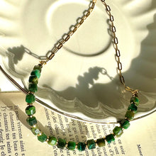Load image into Gallery viewer, Green tiger's eye strand laid flat against a soft neutral background - Let's Jam jewellery, Camden Market, London