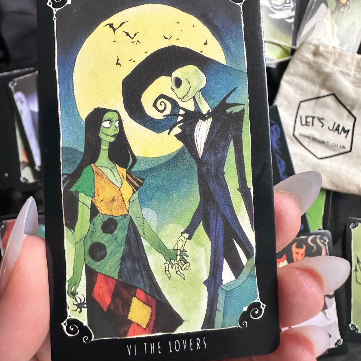 Close view of a single Nightmare Before Christmas tarot card and its artwork - Let's Jam tarot and oracle, Camden Market London