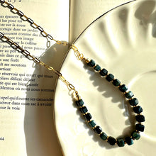 Load image into Gallery viewer, Black tiger's eye necklace coiled on a white plate - Let's Jam, Camden Town London