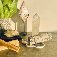 Load image into Gallery viewer, White sage smudge stick resting on a wooden surface - Let's Jam smudge shop, Camden Market, London