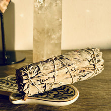 Load image into Gallery viewer, Sage bundle on a ceramic leaf dish beside a crystal - Let's Jam, Camden Town London