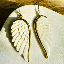 Load image into Gallery viewer, Handcrafted angel wing earrings carved from camel bone with gold-tone brass edging - Let's Jam jewellery collection