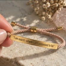 Load image into Gallery viewer, Blush pink cord bracelet with a gold engraved plate on a stone surface - Let's Jam, Camden Market London