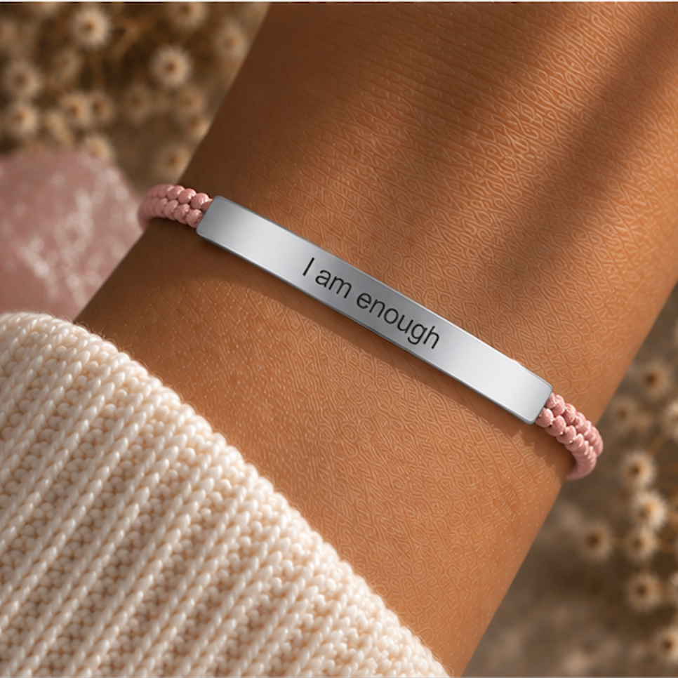 Silver I Am Enough bar with a pale pink beaded cord, worn on the wrist - Let's Jam, Camden Market London