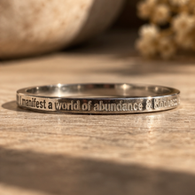 Load image into Gallery viewer, Silver affirmation ring on a rustic wooden surface - Let's Jam jewellery, Camden Town London