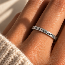 Load image into Gallery viewer, Hand wearing the silver 'I can achieve anything' affirmation ring - Let's Jam jewellery, Camden Town