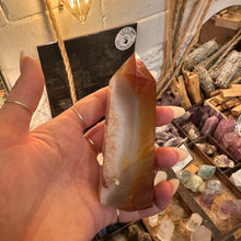 Load image into Gallery viewer, Agate tower turned to show its layers of colour - Let's Jam, Camden Town London