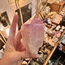 Load image into Gallery viewer, Side view of the amethyst point standing upright on its cut base - Let's Jam, Camden Town