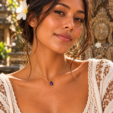 Load image into Gallery viewer, Faceted amethyst tear drop necklace worn with a white lace top - Let's Jam jewellery, Camden Market, London