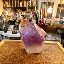 Load image into Gallery viewer, Semi-polished amethyst tower photographed on display in the shop - Let's Jam, Camden Market