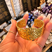 Load image into Gallery viewer, Front of the ornate gold cuff held up - Let's Jam, Camden Town
