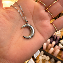Load image into Gallery viewer, Silver big crescent moon pendant held in the hand - Let's Jam, Camden Market London