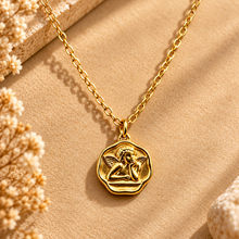 Load image into Gallery viewer, Gold cupid medallion pendant on a chain - Let's Jam, Camden Market London
