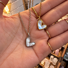 Load image into Gallery viewer, Gold and silver cute mother of pearl heart necklaces held in the hand - Let's Jam, Camden Town