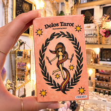 Load image into Gallery viewer, Delos Tarot box front with its mermaid illustration, held in the hand - Let's Jam, Camden Market
