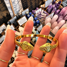Load image into Gallery viewer, Close view of the two gold snake heads on the cuff - Let's Jam, Camden Market