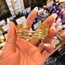 Load image into Gallery viewer, Front of the elegant gold multi band cuff held up - Let's Jam, Camden Market