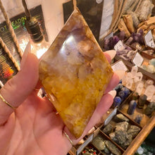 Load image into Gallery viewer, Close up of the polished tip of the fire quartz crystal point - Let's Jam, Camden Town London