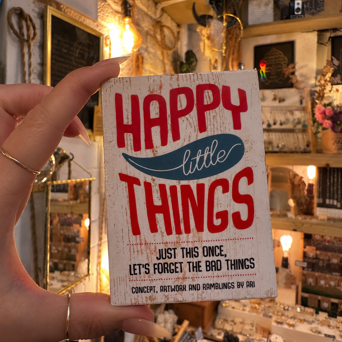 Happy Little Things oracle deck box held in the shop - Let's Jam, Camden Town