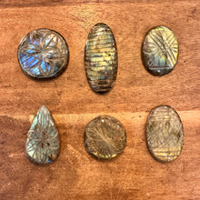 Load image into Gallery viewer, Six labradorite cabochons with carved patterns in two rows of three - Let's Jam, Camden Market