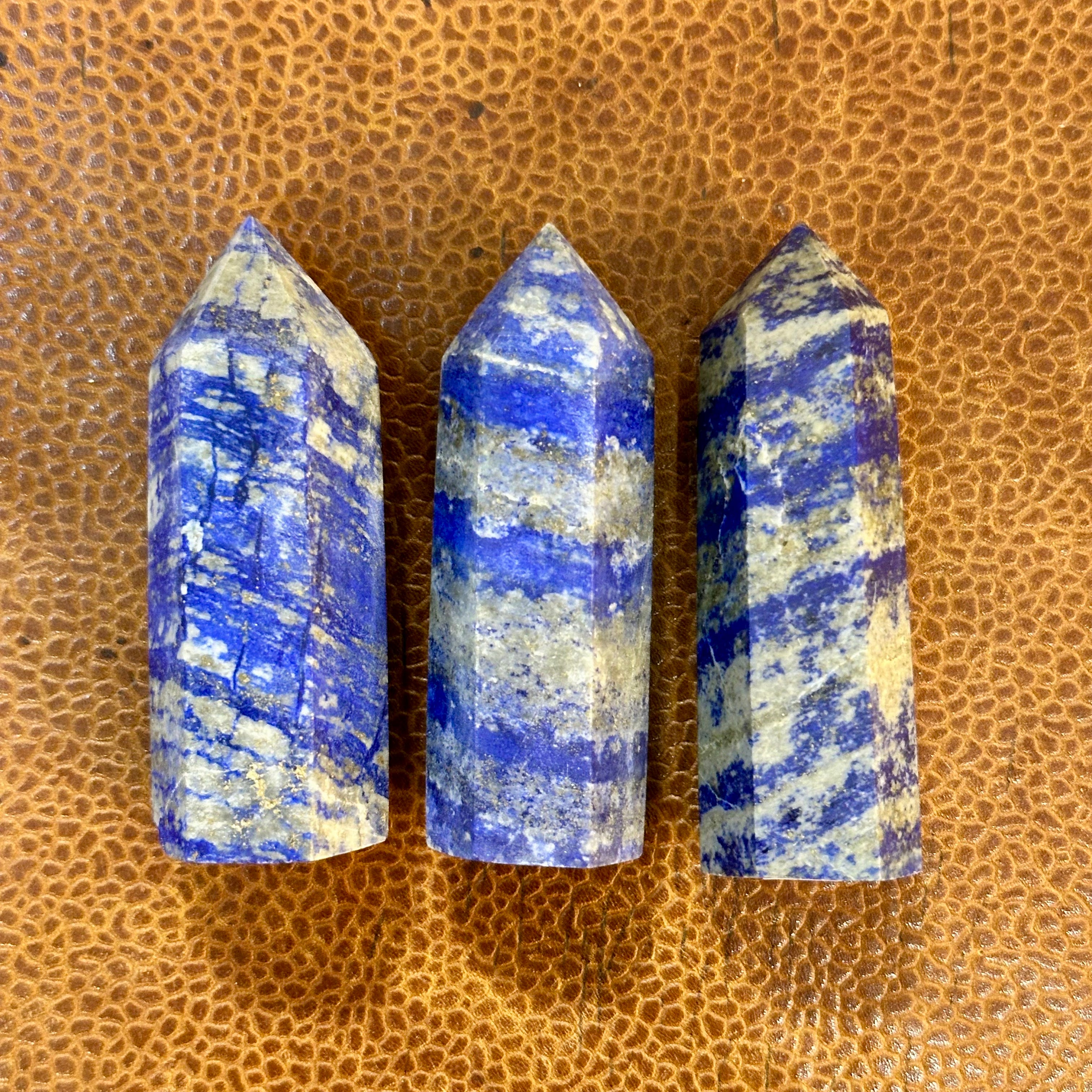 Lapis lazuli towers eleven to thirteen with bold blue stripes - Let's Jam, Camden Market