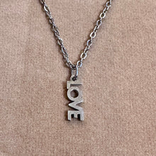 Load image into Gallery viewer, Silver LOVE word pendant on a chain - Let's Jam, Camden Market