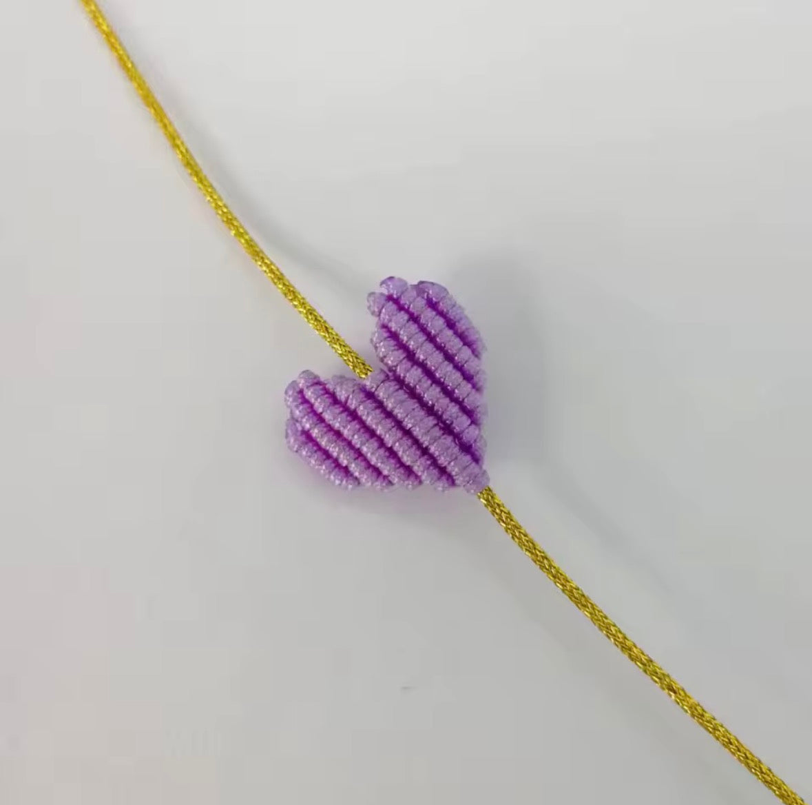 Lilac macramé heart bracelet on a gold cord - Let's Jam, Camden Market, London