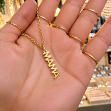 Load image into Gallery viewer, Gold MAMA word necklace held in the hand - Let's Jam, Camden Market London