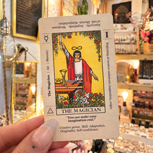 Load image into Gallery viewer, The Magician card with its keywords and meanings printed around the picture - Let's Jam, Camden Market London