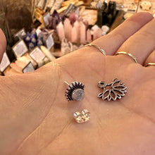 Load image into Gallery viewer, Silver moonstone and lotus stud earring laid in the palm - Let's Jam, Camden Market, London