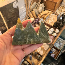 Load image into Gallery viewer, Close detail of the green moss agate patterning inside the crystal tower - Let's Jam, Camden Market, London
