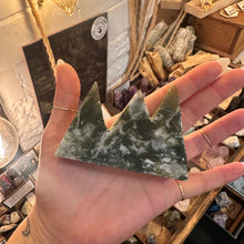 Load image into Gallery viewer, Both moss agate crystal towers photographed together on the shop counter - Let's Jam, Camden Market