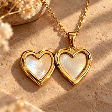 Load image into Gallery viewer, Open gold heart locket showing mother of pearl inside - Let's Jam, Camden Town