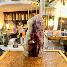 Load image into Gallery viewer, Second rainbow fluorite tower, purple and green, front view - Let's Jam, Camden Market London