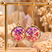Load image into Gallery viewer, Round resin earrings filled with real purple and pink lace flowers on a gold stand - Let's Jam, Camden Market London