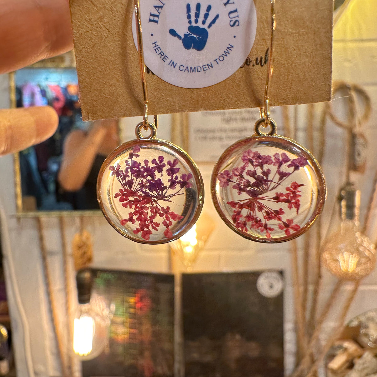 Round resin earrings with real purple and pink lace flowers on a handmade card - Let's Jam, Camden Market, London